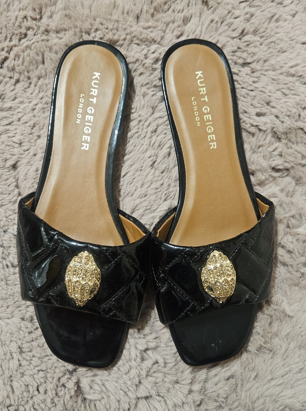 Kurt Geiger Black Patent Slide Mules with Gold Medallion